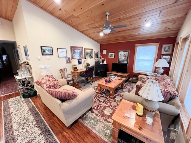 living room featuring wooden ceiling, hardwood / wood-style flooring, ceiling fan, and lofted ceiling