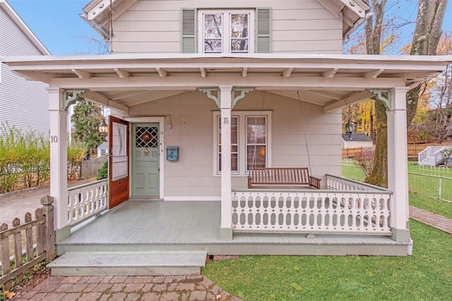 entrance to property with covered porch