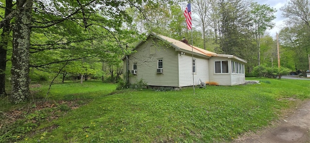 71 Peekamoose Rd, Sundown, NY 12740 - view of home's exterior featuring a yard, cooling unit, and a chimney