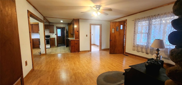 71 Peekamoose Rd, Sundown, NY 12740 - entrance foyer featuring light wood finished floors, ornamental molding, plenty of natural light, ceiling fan, and baseboards