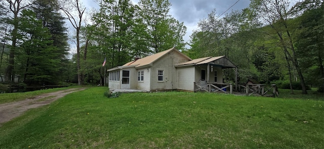 71 Peekamoose Rd, Sundown, NY 12740 - rear view of property with a lawn