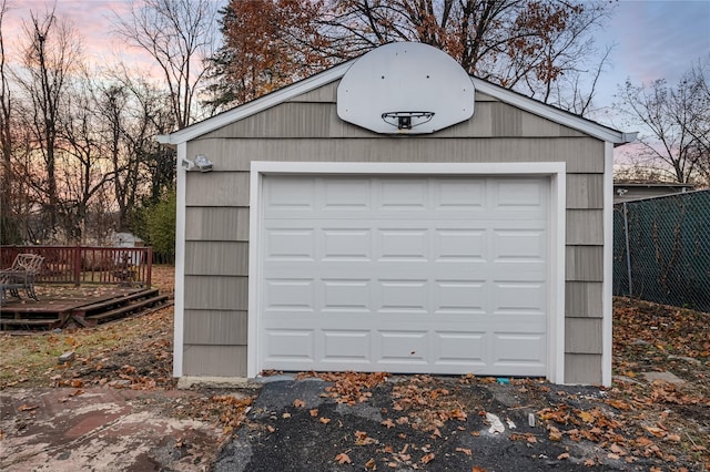 detached garage with fence