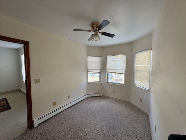 unfurnished room featuring ceiling fan, light carpet, and baseboard heating