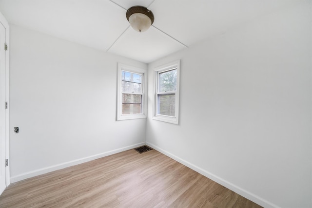 empty room featuring light hardwood / wood-style floors