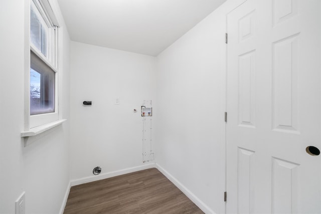 laundry area featuring hookup for an electric dryer, hookup for a washing machine, and dark hardwood / wood-style floors