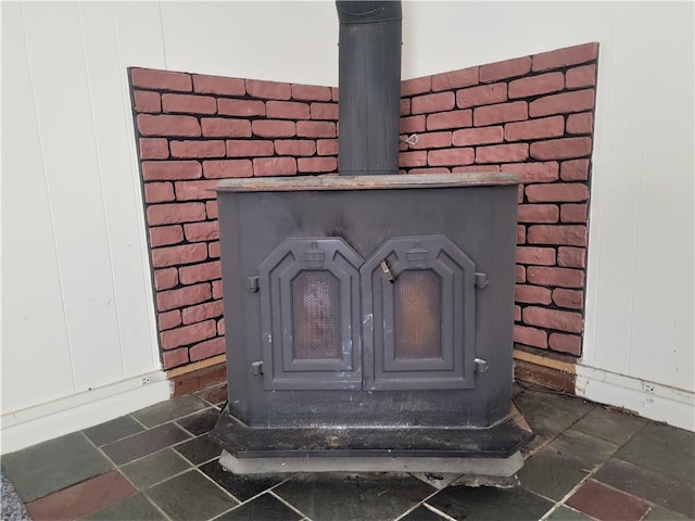 interior details featuring a wood stove