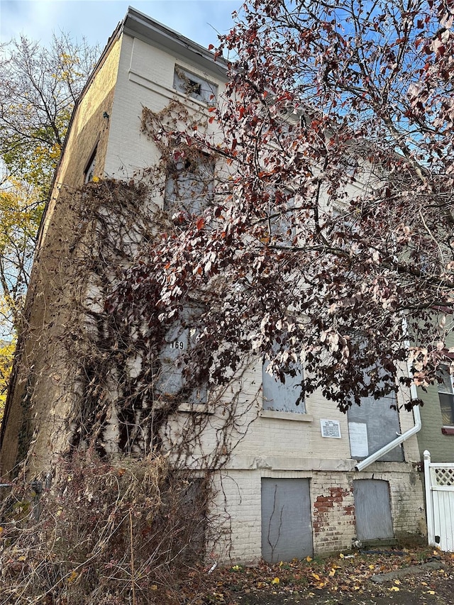 169 Chambers St, Newburgh, NY 12550 - view of side of home with brick siding