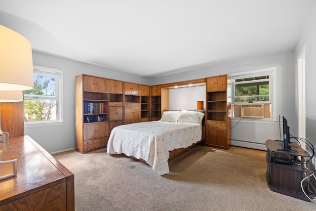 27 Stubbe Dr, Stony Point, NY 10980 - bedroom featuring carpet, cooling unit, and a baseboard radiator