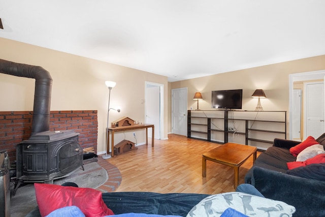 27 Stubbe Dr, Stony Point, NY 10980 - living room with a wood stove and wood finished floors