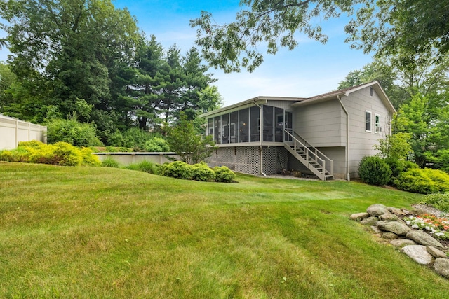 27 Stubbe Dr, Stony Point, NY 10980 - rear view of property with a sunroom and stairway