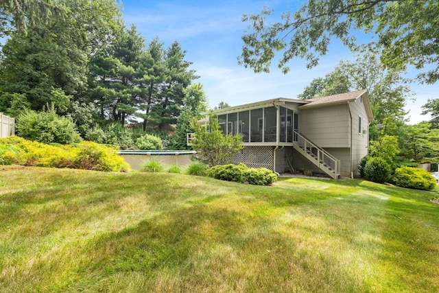 27 Stubbe Dr, Stony Point, NY 10980 - view of green lawn with a sunroom, stairway, and an outdoor pool