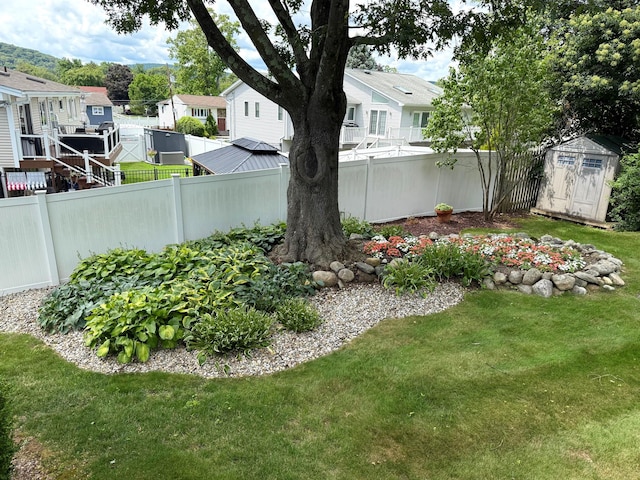 27 Stubbe Dr, Stony Point, NY 10980 - fenced backyard featuring a storage shed and a residential view