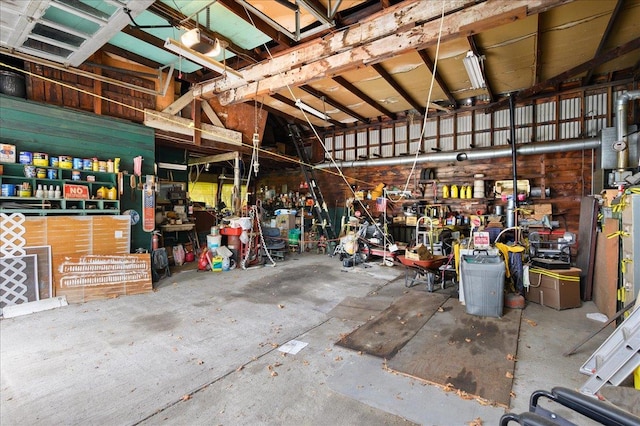 garage with a workshop area