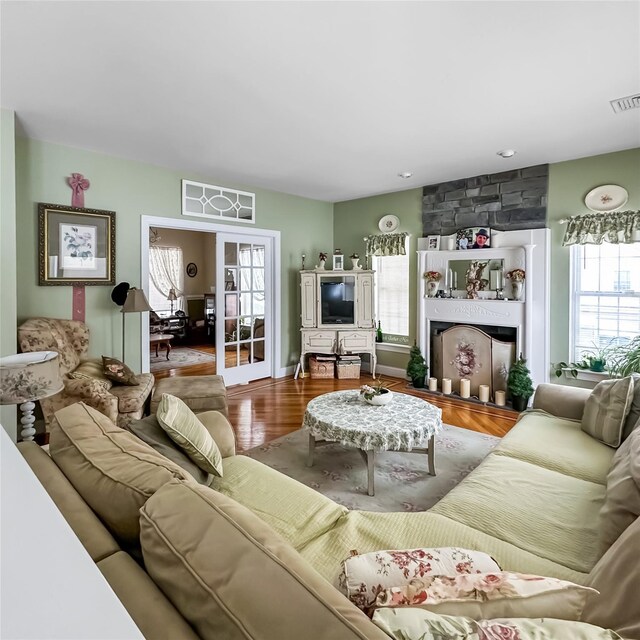 37 Woodcock Mtn Rd, Washingtonville, NY 10992 - living room featuring wood finished floors and a large fireplace