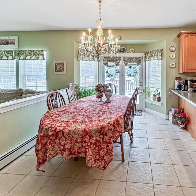37 Woodcock Mtn Rd, Washingtonville, NY 10992 - dining space with plenty of natural light, a chandelier, light tile patterned flooring, and a baseboard radiator