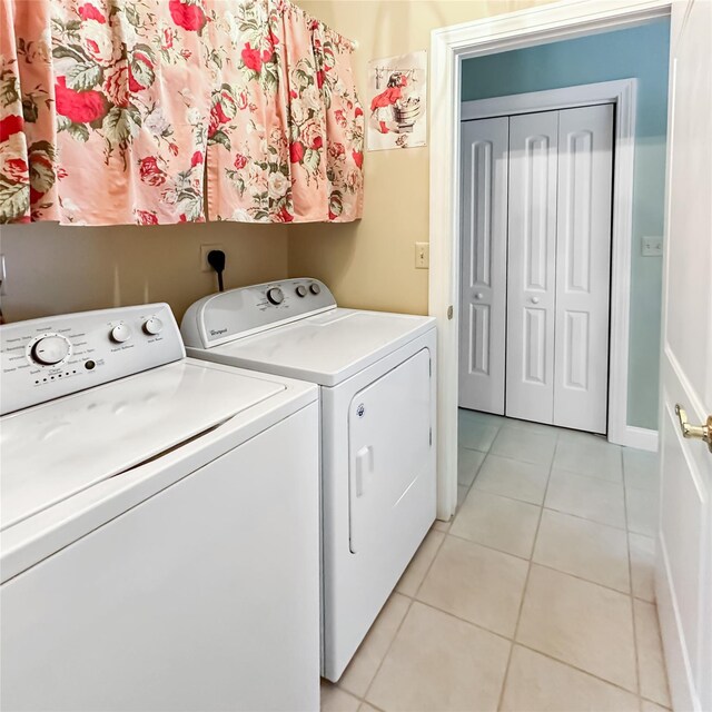 37 Woodcock Mtn Rd, Washingtonville, NY 10992 - washroom with washing machine and clothes dryer and light tile patterned floors