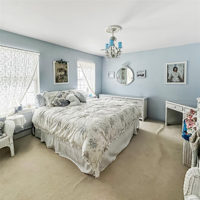 37 Woodcock Mtn Rd, Washingtonville, NY 10992 - bedroom featuring multiple windows, a chandelier, and light colored carpet