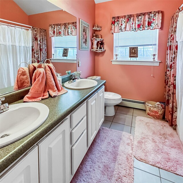 37 Woodcock Mtn Rd, Washingtonville, NY 10992 - full bath featuring a baseboard radiator, double vanity, tile patterned flooring, toilet, and curtained shower