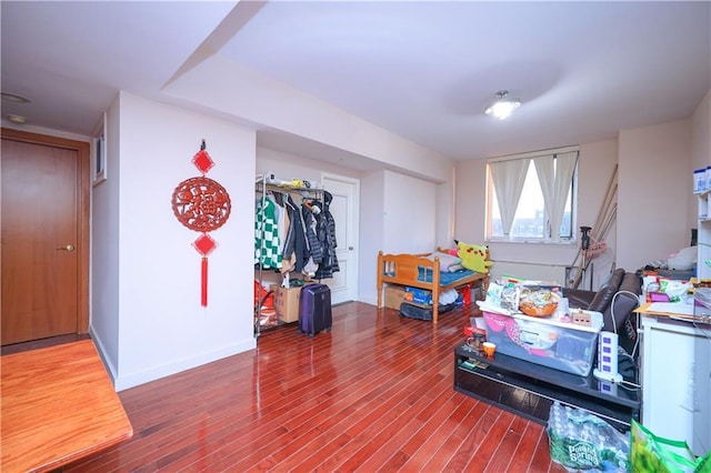 rec room featuring hardwood / wood-style flooring