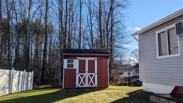 view of outdoor structure featuring a yard