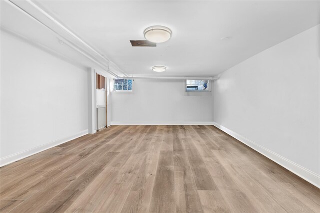 basement featuring light hardwood / wood-style floors