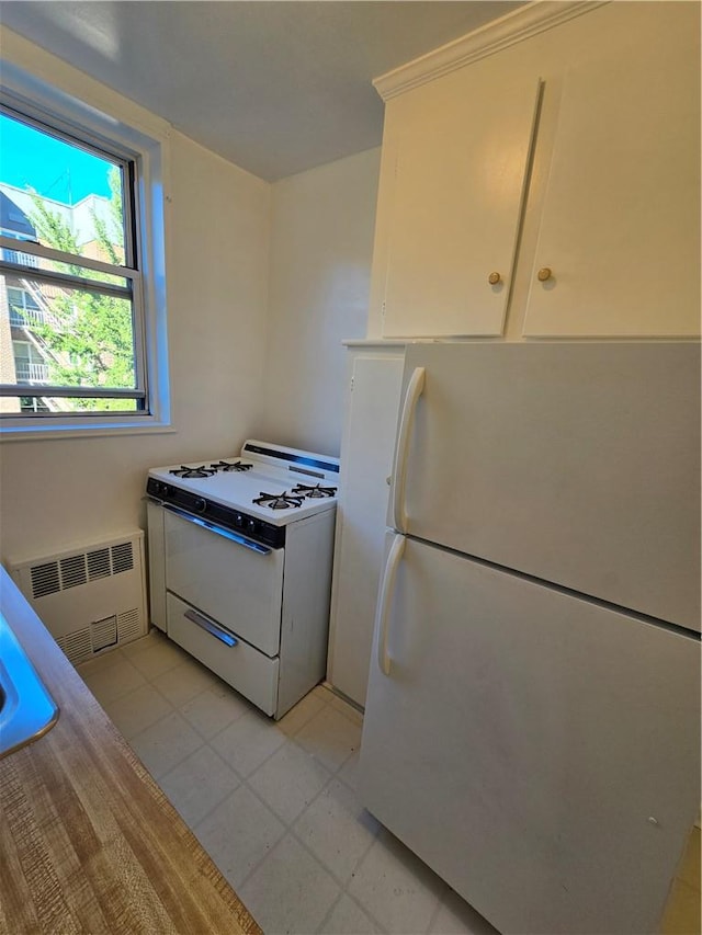 kitchen with white cabinetry