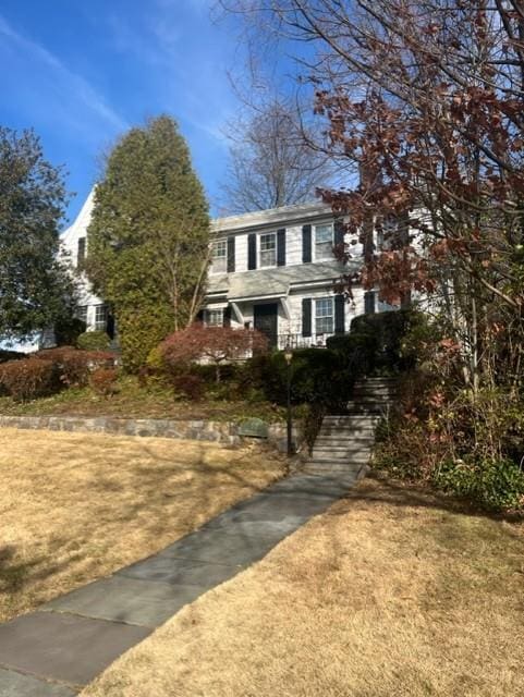 view of front of home with a front yard