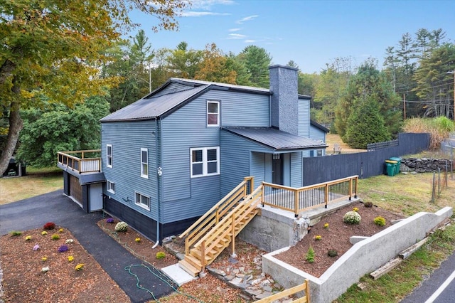 back of house with a garage