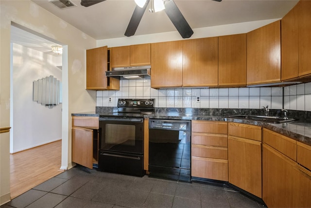 kitchen featuring black appliances, sink, dark hardwood / wood-style floors, ceiling fan, and decorative backsplash