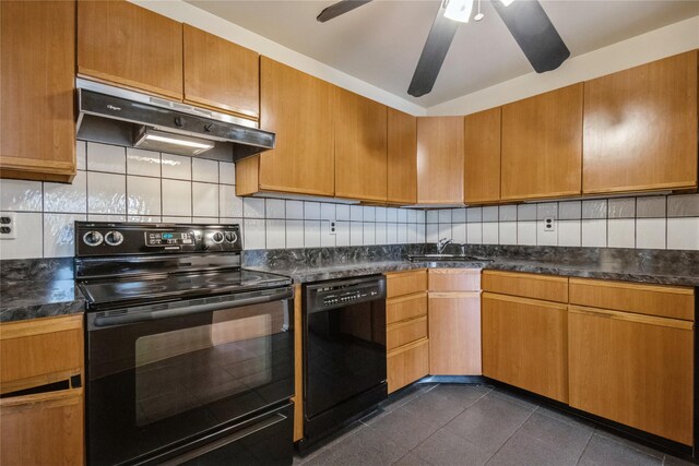 kitchen featuring black appliances, dark tile patterned flooring, sink, ceiling fan, and tasteful backsplash