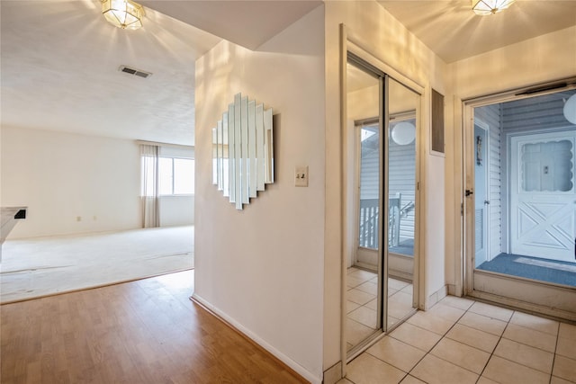 doorway featuring light hardwood / wood-style floors