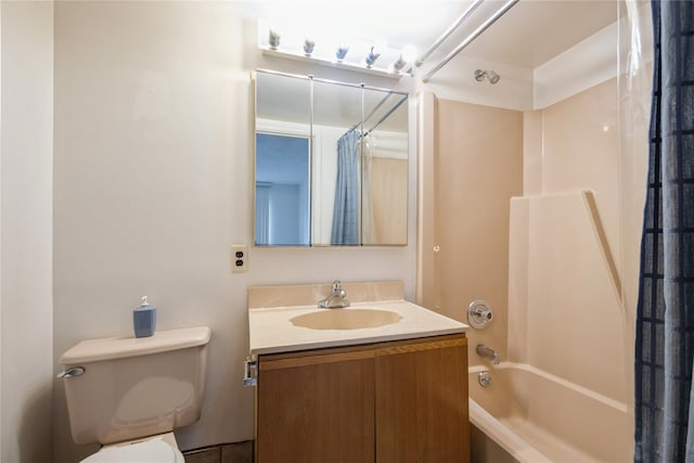 full bathroom with vanity, toilet, and shower / tub combo