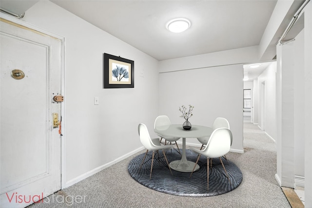 3555 Kings College Pl Unit 1H, Bronx, NY 10467 - carpeted dining area with baseboards