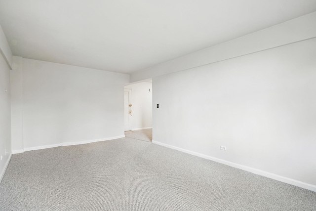 3555 Kings College Pl Unit 1H, Bronx, NY 10467 - empty room featuring baseboards and light colored carpet