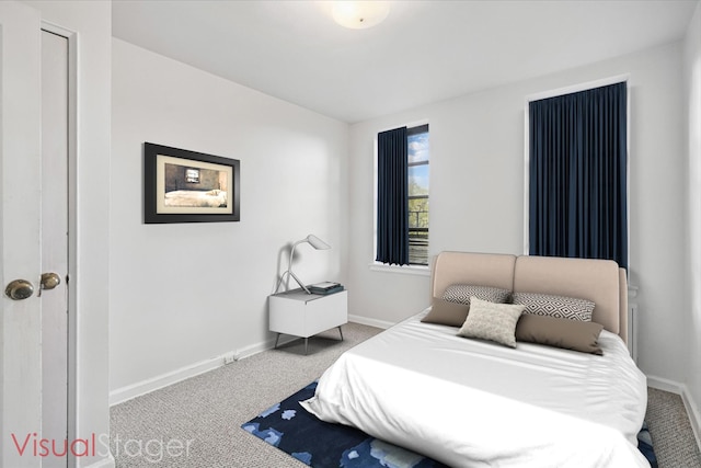 3555 Kings College Pl Unit 1H, Bronx, NY 10467 - bedroom with baseboards and carpet
