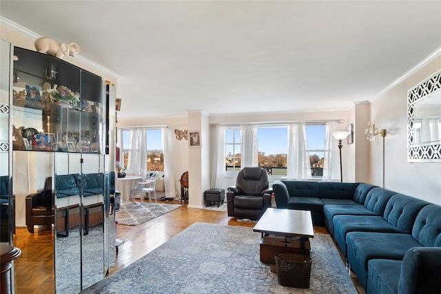 living room with plenty of natural light, ornamental molding, and parquet floors