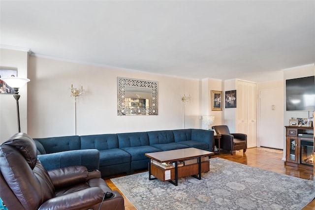 living room featuring crown molding and wood-type flooring