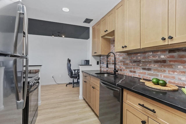 500 High Point Dr Unit 709, Hartsdale, NY 10530 - kitchen with dishwashing machine, freestanding refrigerator, black electric range, light brown cabinets, and light wood finished floors