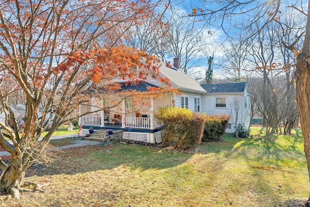 view of front of home with a front yard