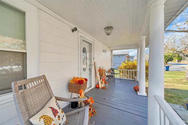 wooden deck with a porch