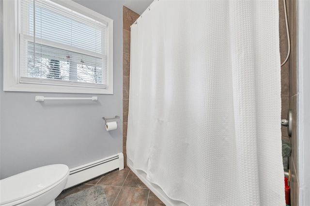 bathroom featuring tile patterned flooring, a shower with shower curtain, a baseboard radiator, and toilet