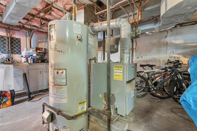 utility room featuring gas water heater