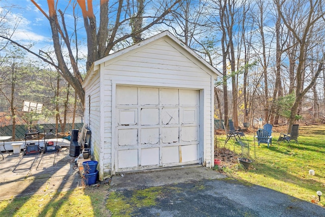 garage with a yard