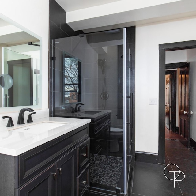 bathroom featuring vanity and walk in shower