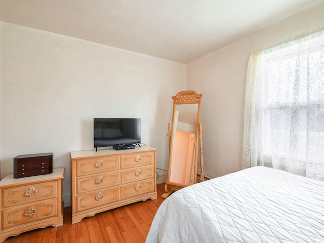 bedroom featuring light wood-type flooring