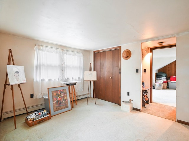 interior space featuring carpet floors and a baseboard radiator