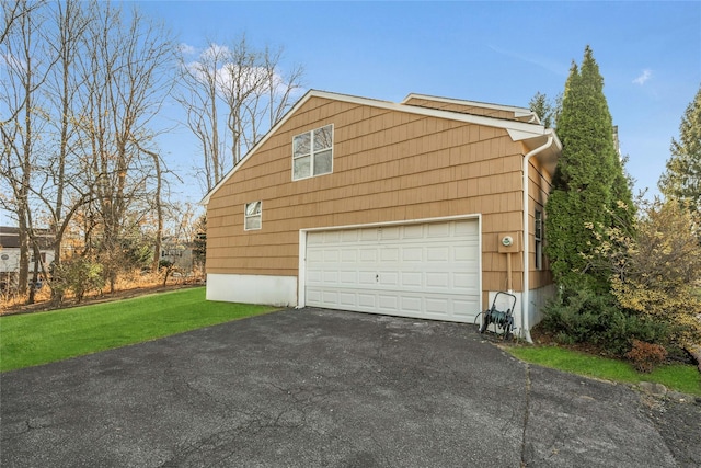 garage with a lawn