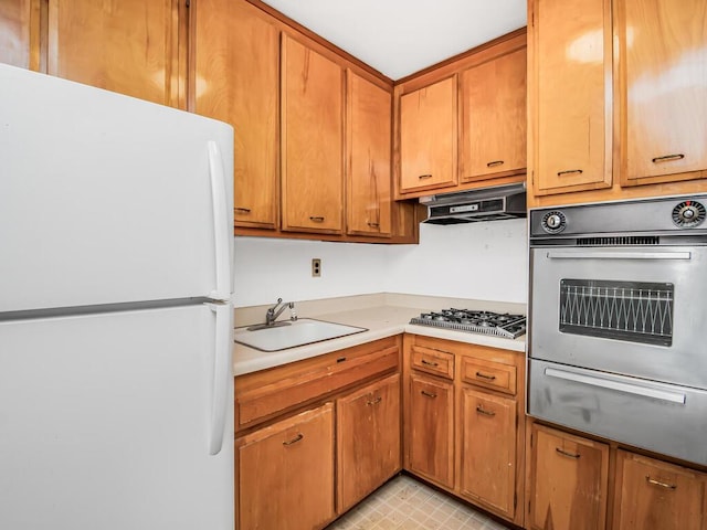 kitchen with sink and stainless steel appliances