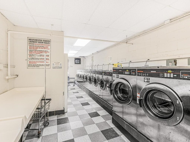 washroom with independent washer and dryer