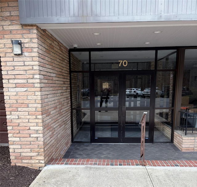 property entrance featuring french doors